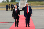 Президент России Владимир Путин и президент США Дональд Трамп во время встречи на Аляске