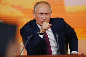 Президент России Владимир Путин во время ежегодной пресс-конференции в Москве, 14 декабря 2017 года