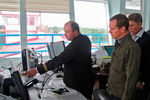 Премьер-министр России Дмитрий Медведев во время посещения аэропорта на острове Итуруп на Курильских островах