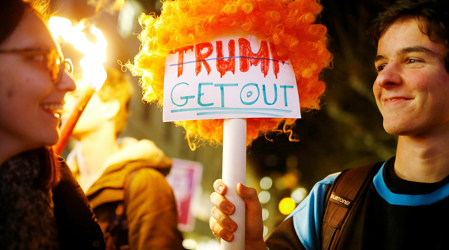 Акция протеста против визита президента США Дональда Трампа в Швейцарию в Женеве, 23 января 2018 года