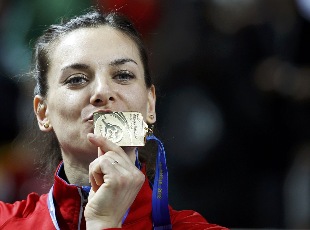 Елена Исинбаева и золотая медаль.