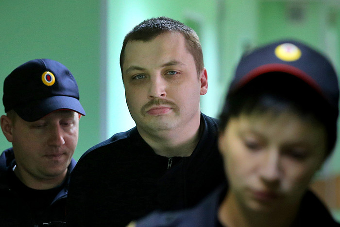 Михаил Косенко, обвиняемый в участии в массовых беспорядках на Болотной площади 6 мая 2012 года