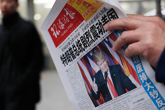 Китайская газета с заголовком «Избрание Трампа президентом стало шоком для Америки», Пекин, Китай