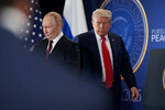 Президент РФ Владимир Путин и президент США Дональд Трамп во время пресс-конференции на военной базе Эльмендорф - Ричардсон на Аляске, 16 августа 2025 года