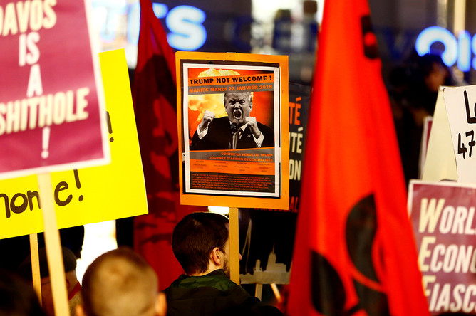 Акция протеста против визита президента США Дональда Трампа в Швейцарию в Женеве, 23 января 2018 года