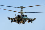 Вертолет Ка-52 «Аллигатор» во время боевой операции в окрестностях освобожденного от боевиков города Эль-Карьятейн