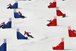 Сноубордистки из Японии и Швейцарии во время Олимпиады в Сочи, 2014 год