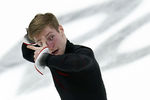 Александр Самарин во время произвольной программы мужского одиночного катания на V этапе Гран-при по фигурному катанию в Москве