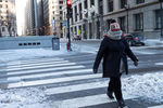 Пешеход на одной из улиц в Чикаго, США, 30 января 2019 года