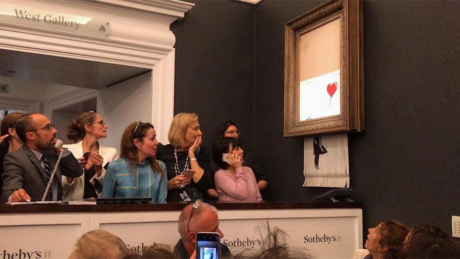 «Девочка с красным шаром», известная картина британского художника Бэнкси, самоуничтожилась сразу после продажи за миллион фунтов на аукционе «Сотбис», 6 сентября 2018 года