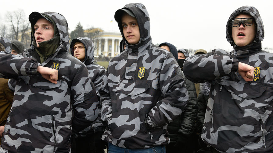 Участники акции национального корпуса (организация запрещена в&nbsp;РФ) на&nbsp;площади Свободы в&nbsp;Киеве, 16 марта 2019 года