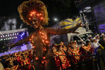 Во время празднования карнавала на Самбадроме в Рио-де-Жанейро, Бразилия, 13 февраля 2024 года
