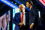 Президент США Дональд Трамп с основателем консервативной организации Turning Point USA Чарли Кирком на фестивале AmericaFest в Финиксе, Аризона, 2024 год