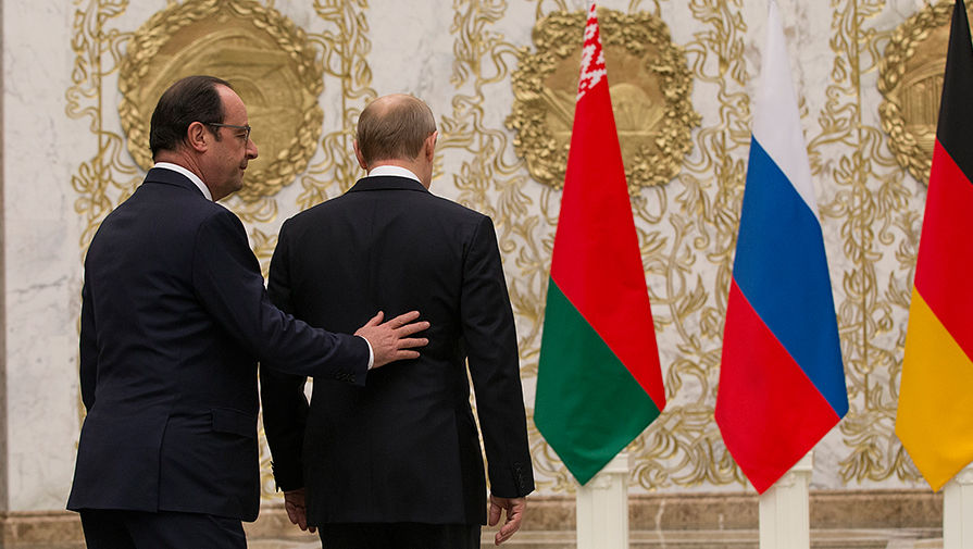 Французский президент Франсуа Олланд и президент России Владимир Путин на переговорах в Минске, февраль 2015 года