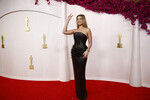 Актриса Марго Робби на 96-й церемонии вручения кинопремии «Оскар» в Лос-Анджелесе, 10 марта 2024 года 