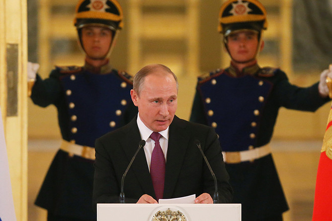 Владимир Путин во время встречи с российской олимпийской сборной в Александровском зале Большого Кремлевского дворца