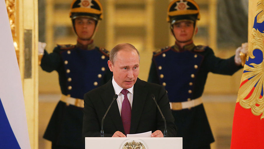 Владимир Путин во время встречи с российской олимпийской сборной в Александровском зале Большого Кремлевского дворца
