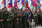 Участники отрядов Севастопольской обороны во время праздничных мероприятий, посвященных второй годовщине присоединения Крыма к России, в Севастополе