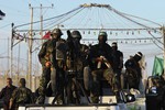 Патруль ХАМАС на КПП «Рафах», через который проследовала автоколонна с помилованными палестинскими осужденными.