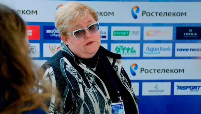 Тренер россиян Натальи Забияко и Александра Энберта, занимающих первое место после короткой...