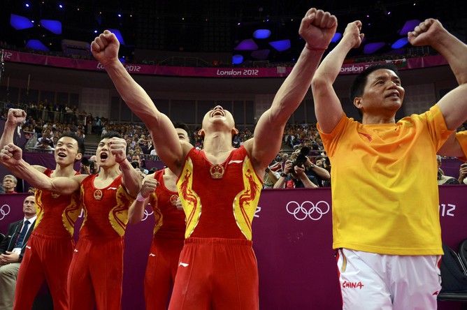Мужская сборная Китая по спортивной гимнастике завоевала золото