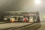 Сгоревший автобус возле здания акимата Алма-Аты, 5 января 2022 года