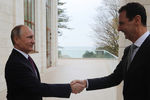 Президент России Владимир Путин и президент Сирии Башар Асад во время встречи в Сочи, 20 ноября 2017 года