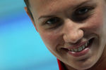 Анастасия Зуева с золотой медалью за победу на дистанции 100 метров на спине.
