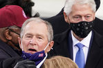 Экс-президенты США Джордж Буш — младший и Билл Клинтон во время церемонии инаугурации 46-го президента США в Вашингтоне, 20 января 2021 года