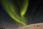 Полярное сияние в небе над Хусавиком, Исландия, 13 февраля 2022 года