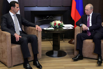 Президент Сирии Башар Асад и президент России Владимир Путин во время встречи в Сочи, 20 ноября 2017 года
