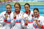 Сборная России по плаванию завоевала серебряные медали в эстафете 4х200 метров.