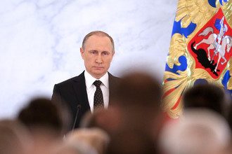 Президент России Владимир Путин во время выступления с ежегодным посланием к Федеральному собранию РФ в Кремле