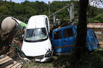  Автомобили, поврежденные в результате подтопления, в микрорайоне Мацеста в Сочи, 14 июня 2023 года