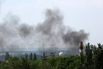 Дым над международного аэропортом Донецка