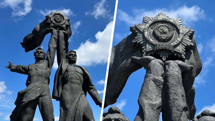 В Киеве демонтируют советскую скульптуру с двумя рабочими с монумента Дружбы народов