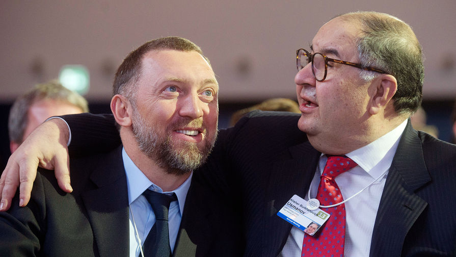 Предприниматели Олег Дерипаска и Алишер Усманов на Всемирном экономическом форуме в Давосе, 2013 год