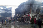 На месте тушения пожара в торговых центрах в Кизляре (Дагестан), 1 февраля 2019 года 