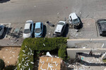 Последствия ракетных ударов в жилом квартале в Ашкелоне, Израиль, 7 октября 2023 года
