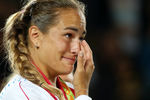 Пуиг не может сдержать эмоций после победы в финале Олимпиады. Она выиграла для своей страны первую медаль высшего достоинства