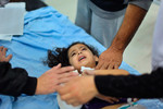 Северная Газа. Раненая при налете израильской авиации арабская девочка