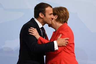 Президент Франции Эммануэль Макрон и канцлер Германии Ангела Меркель на саммите G20 в Гамбурге, 7 июля 2017 года