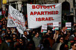 Участники протеста в поддержку Палестины в Дублине, Ирландия, 14 октября 2023 года