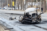Автомобиль, уничтоженный в результате обстрела со стороны ВСУ в Белгороде, 14 марта 2024 года