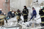 На месте взрыва газа на цокольном этаже девятиэтажного жилого дома на Мещерском бульваре Канавинского района в Нижнем Новгороде, 26 февраля 2021 года