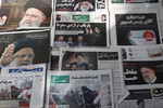 Иранские газеты с фотографиями покойного президента Ирана Эбрахима Раиси, 21 мая 2024 года