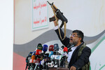 Член высшего политического совета хуситов Мохаммед Али аль-Хуси выступает на митинге после авиаударов США и Великобритании по объектам хуситов в Сане, Йемен, 12 января 2024 года
