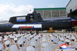 Во время церемонии спуска на воду новой тактической атомной подводной лодки в Северной Корее, 8 сентября 2023 года