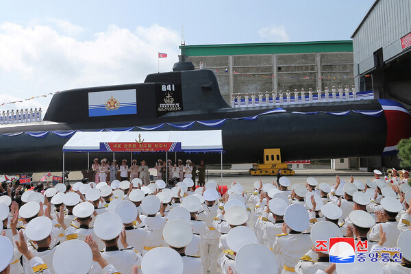 Во время церемонии спуска на&nbsp;воду новой тактической атомной подводной лодки в&nbsp;Северной Корее, 8&nbsp;сентября 2023&nbsp;года