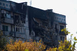 Разрушенный жилой дом в районе аэропорта города Донецка